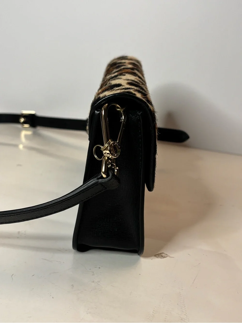 Furla Bella mini crossbody with leopard print calf hair and leather. Adjustable